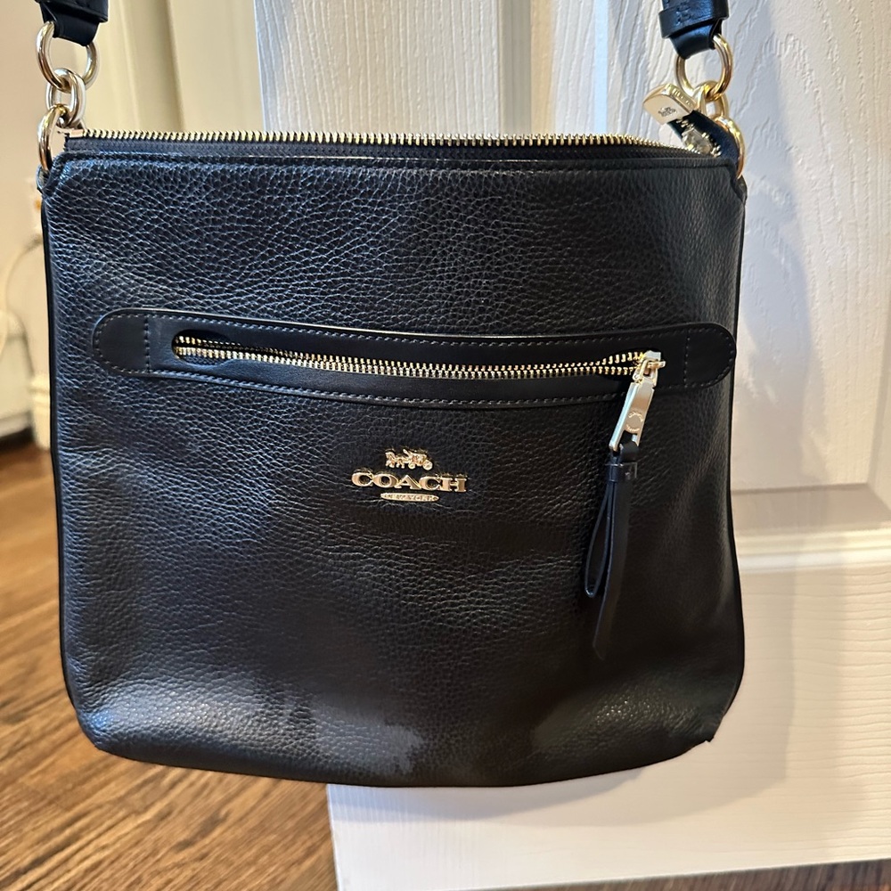 Coach Black Crossbody Bag with Sleek Design and Silver Hardware